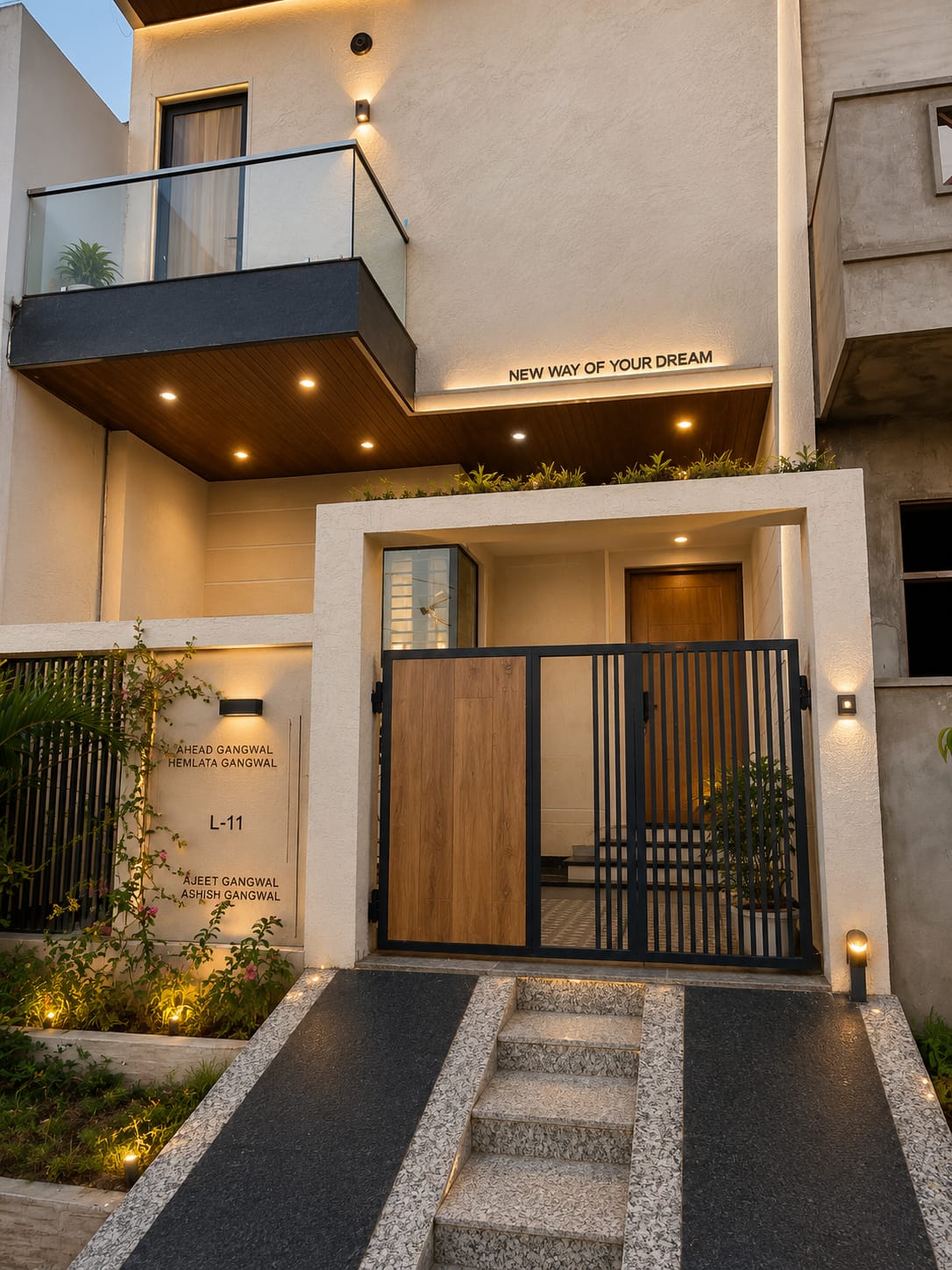 Modern villa entrance with wooden gate at dusk